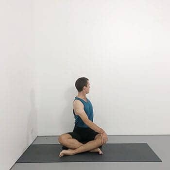 simple cross leg twist iyengar yoga pose